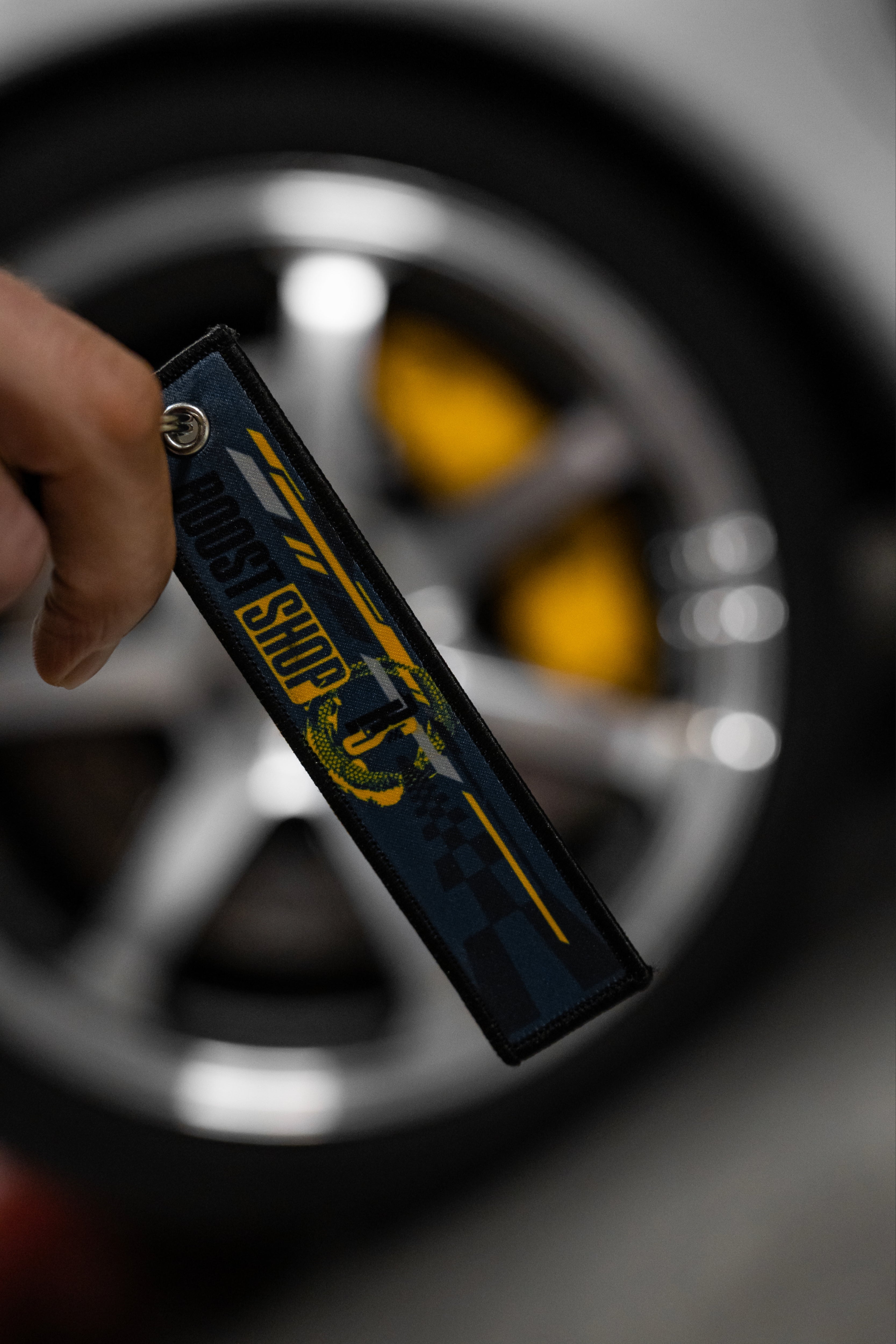 BOOST SHOP - Porte-clés « Précurseur »