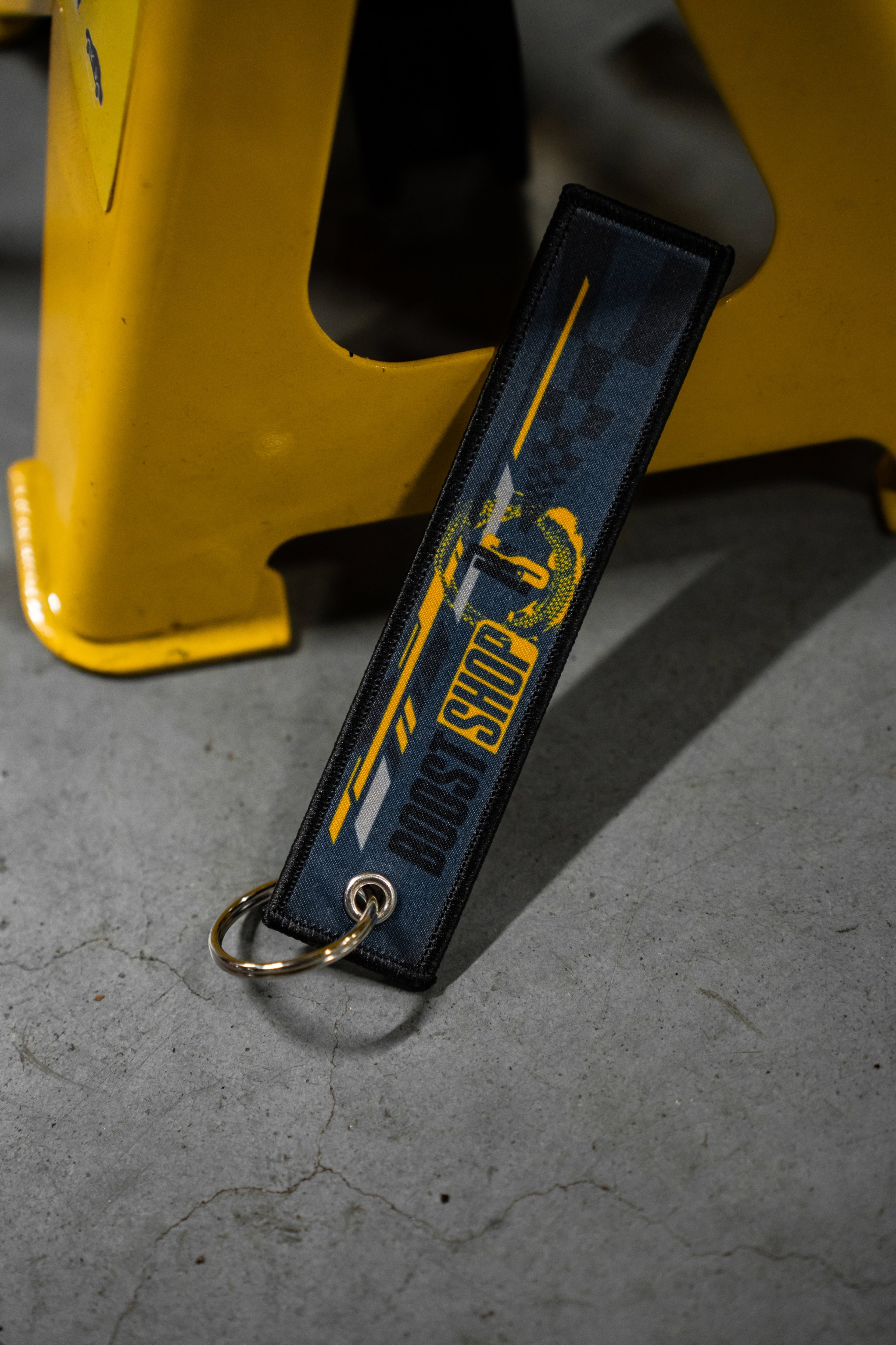 BOOST SHOP - Porte-clés « Précurseur »